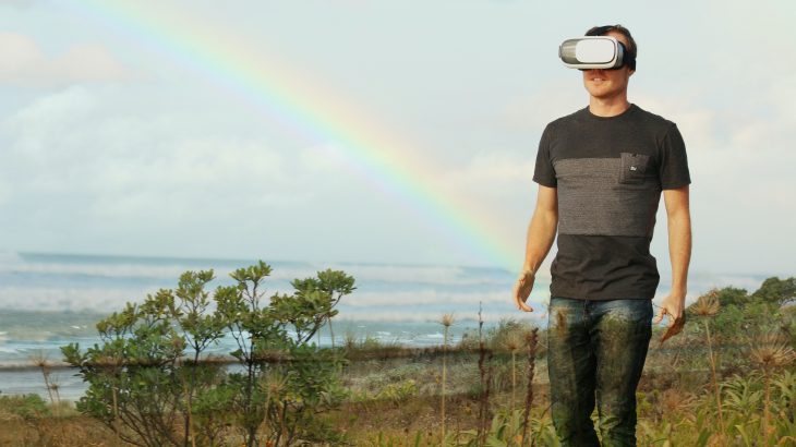 Man wearing a VR headset in a semi-digital world