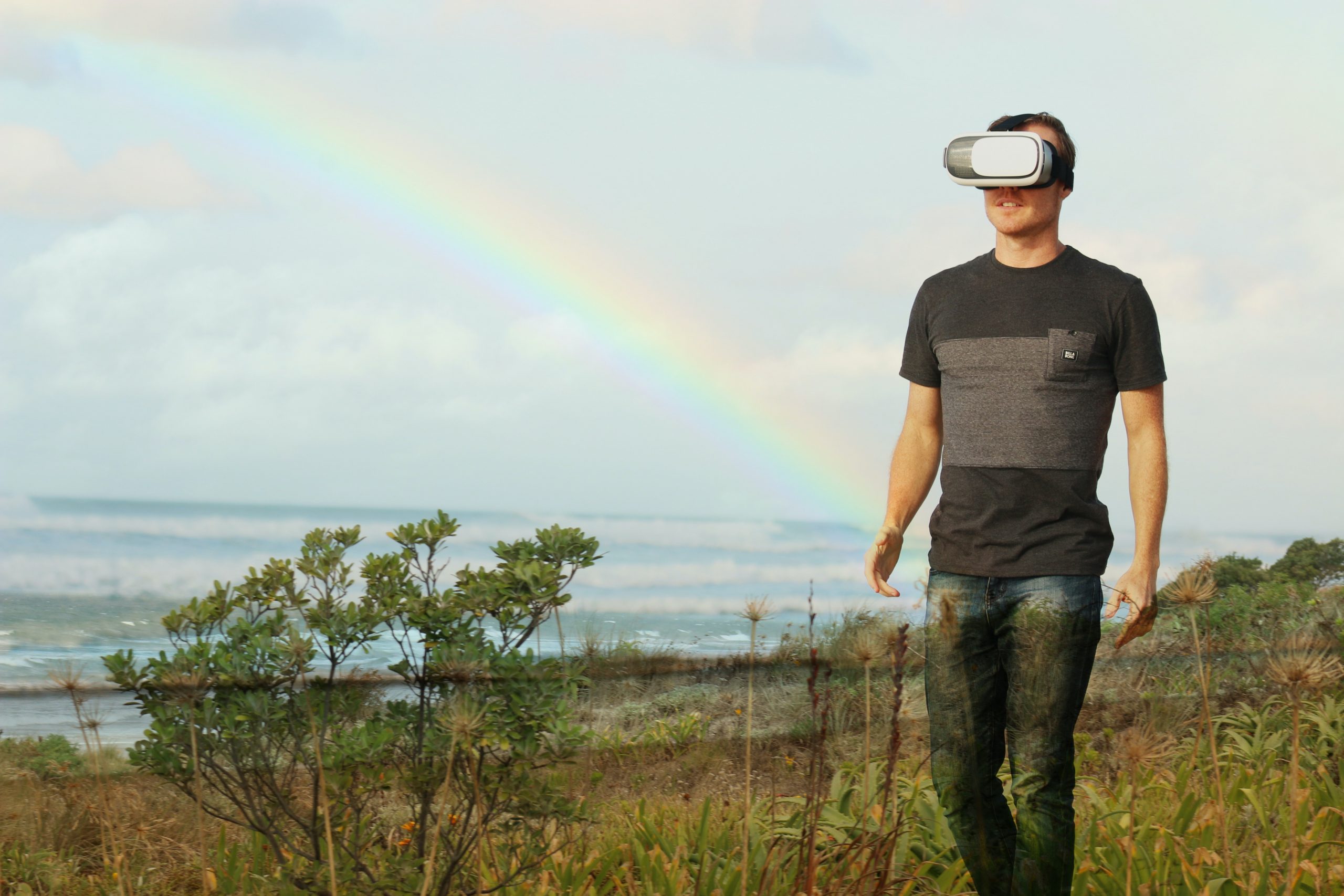 Man wearing a VR headset in a semi-digital world