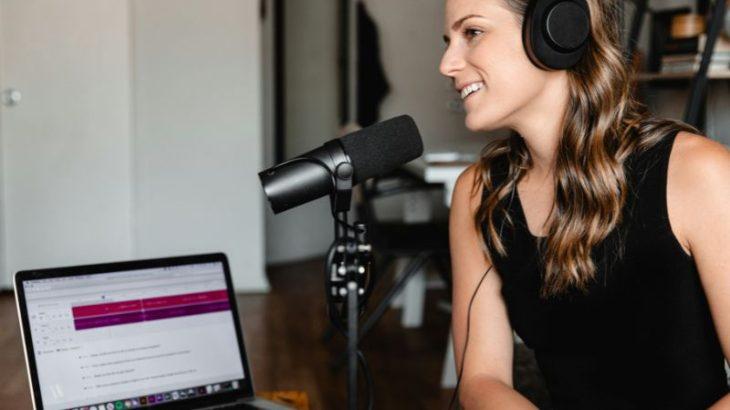 Girl recording a podcast.