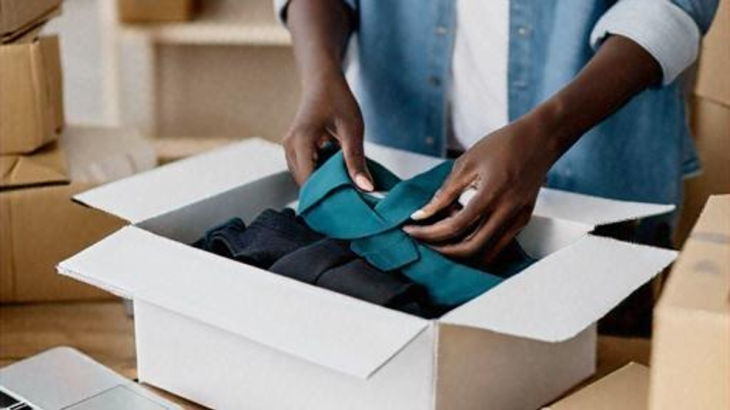 Fashion startup brand packing an order