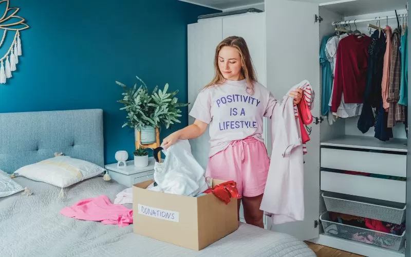 Person donating clothes.