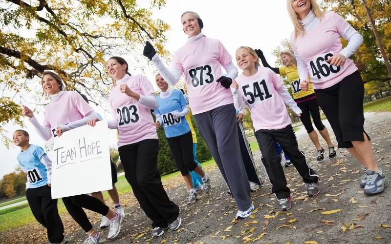 Pink charity team running tops.