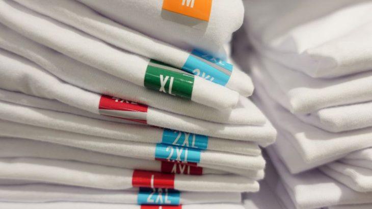 T.shirts stacked in different sizes.