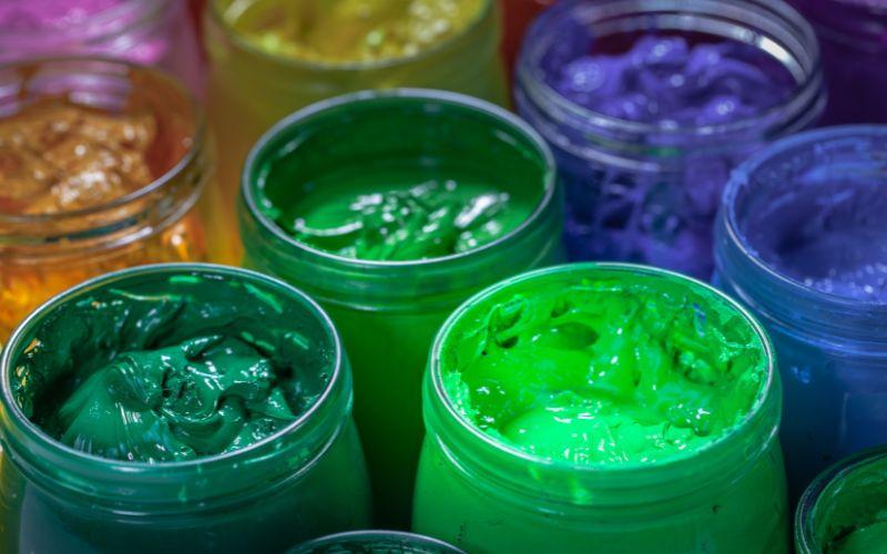 Pots of vibrant screen printing ink.