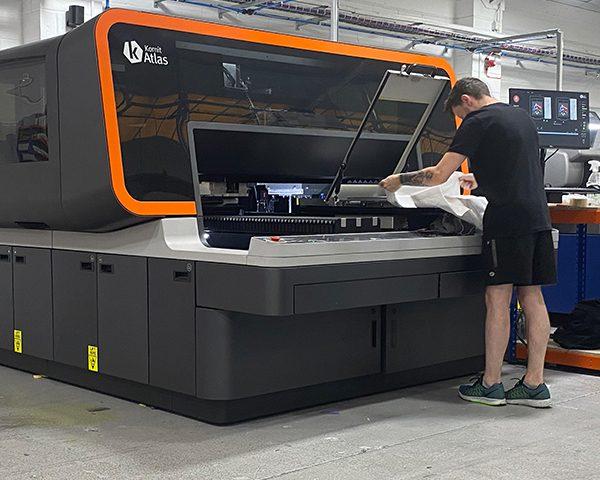 Direct-to-garment T-shirt printing on a Kornit Atlas DTG printer