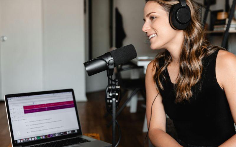 Girl recording a podcast.