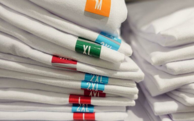 T.shirts stacked in different sizes.