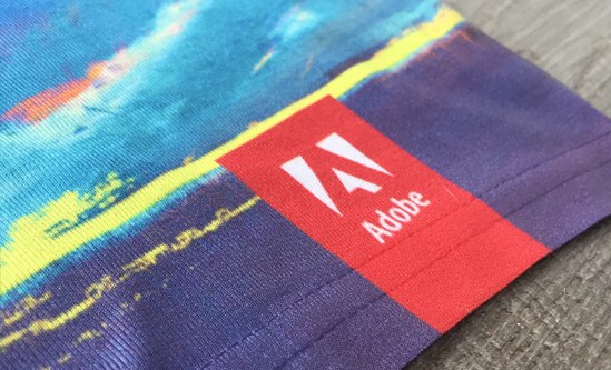 Adobe all-over printed event merchandise